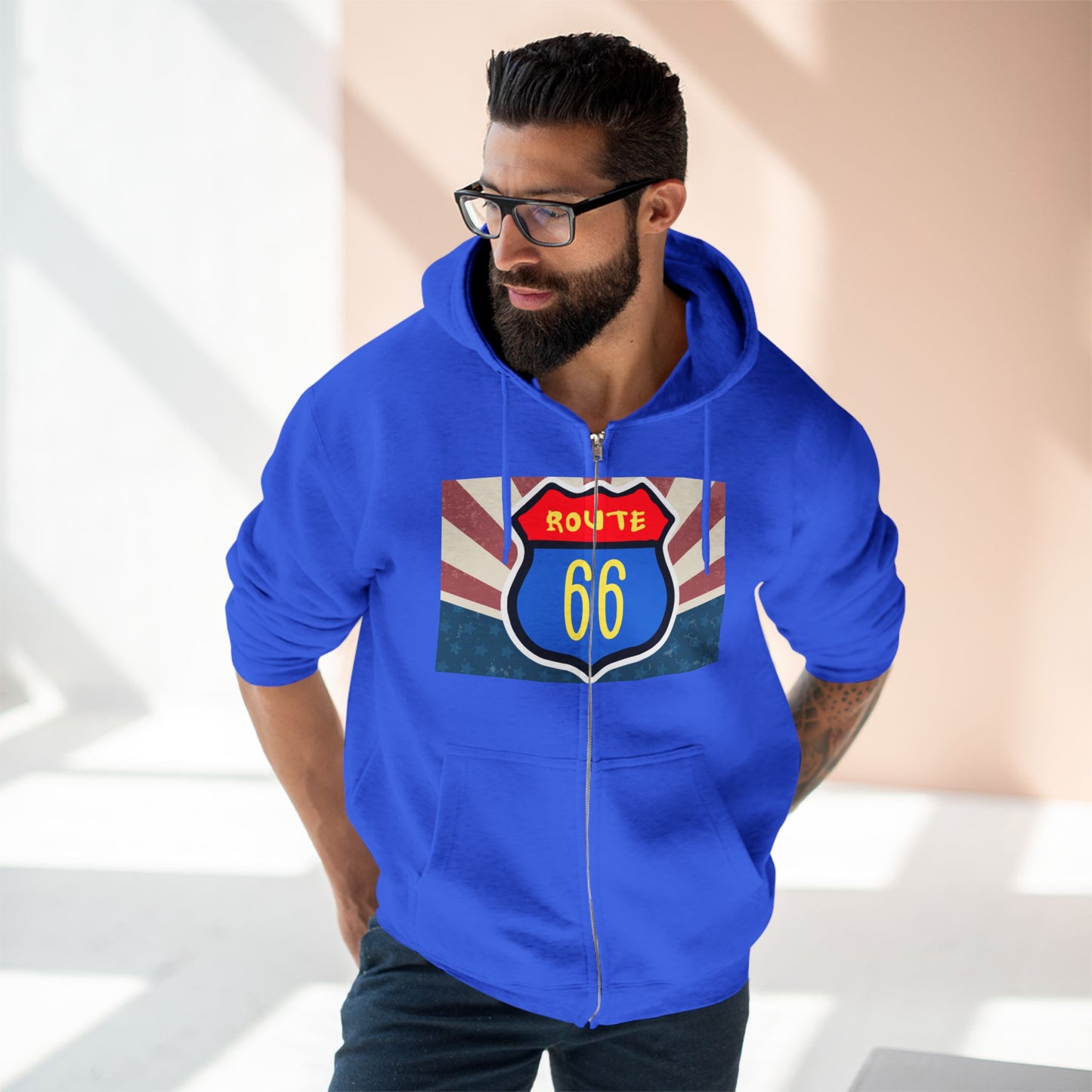 Man wearing a true royal Retro Route 66 zip hoodie, hands in pockets, styled for casual everyday wear.
