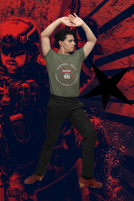 Male model doing a yoga pose while wearing a heather military green retro Route 66 unisex jersey tee with Alanreed, TX: "Formerly Known as Gouge Eye" design