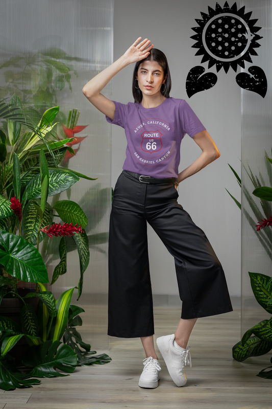 Female model wearing heather team purple retro Route 66 unisex jersey tee with Azusa, CA: "San Gabriel Canyon" design