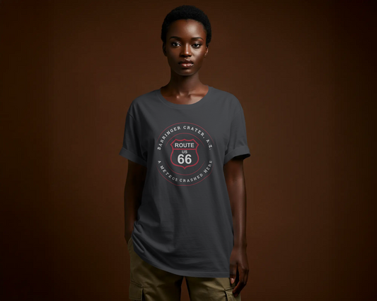 Female model wearing a vintage black retro Route 66 unisex jersey tee with Barringer Crater, AZ: "A Meteor Crashed Here" design