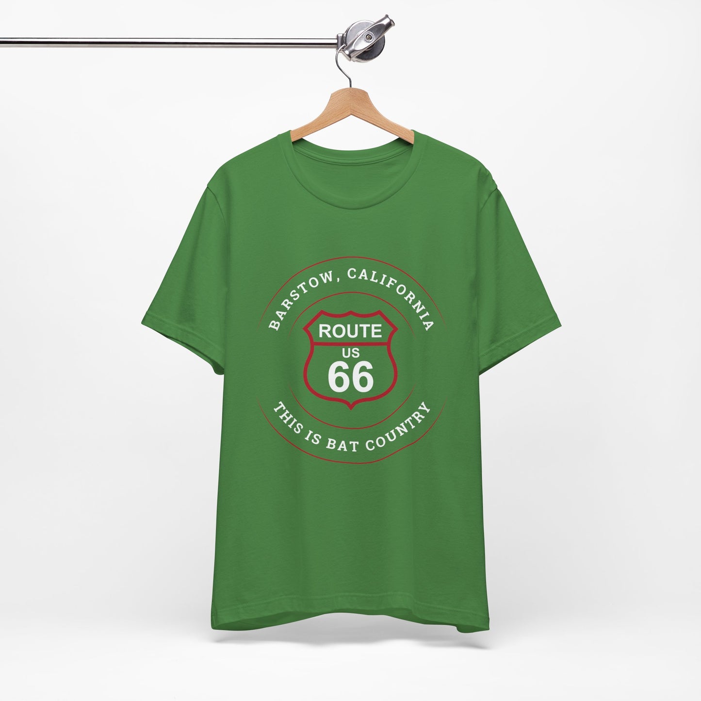 Leaf retro Route 66 unisex jersey tee with Barstow, CA: "This is Bat Country" design hanging on a metal bar