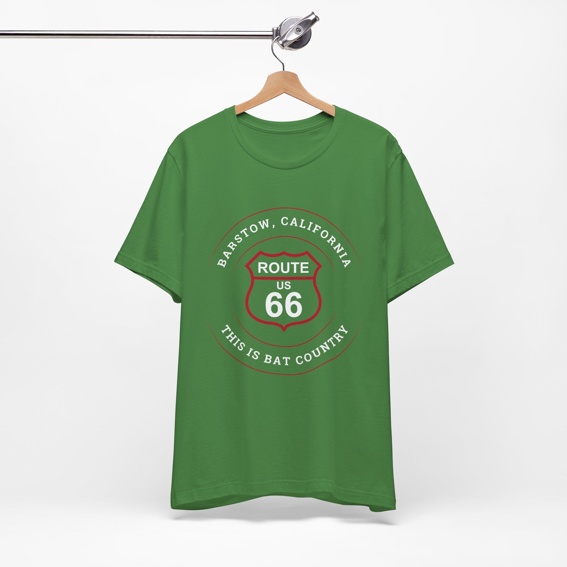 Leaf retro Route 66 unisex jersey tee with Barstow, CA: "This is Bat Country" design hanging on a metal bar