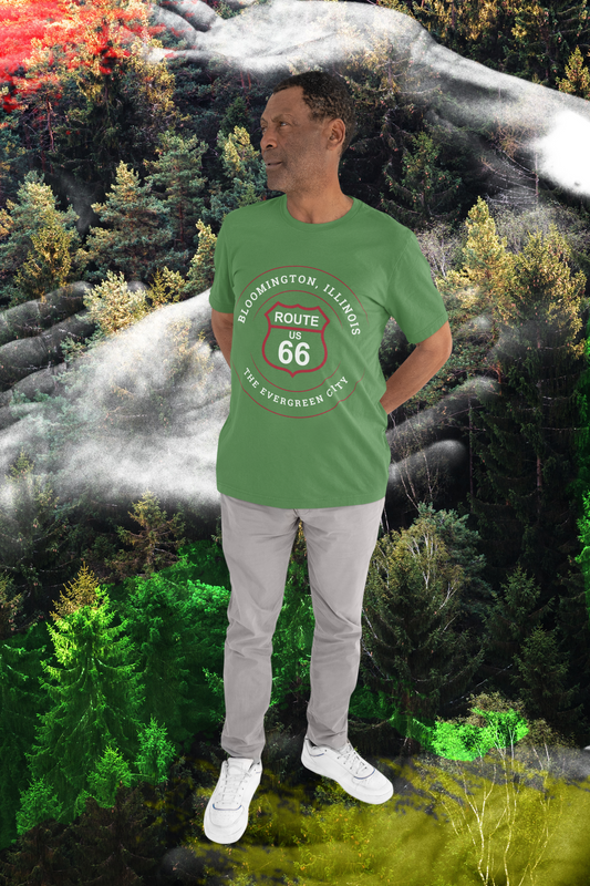 Male model standing in a forest and wearing a leaf retro Route 66 unisex jersey tee with a Normal, IL: "The Norm" design 