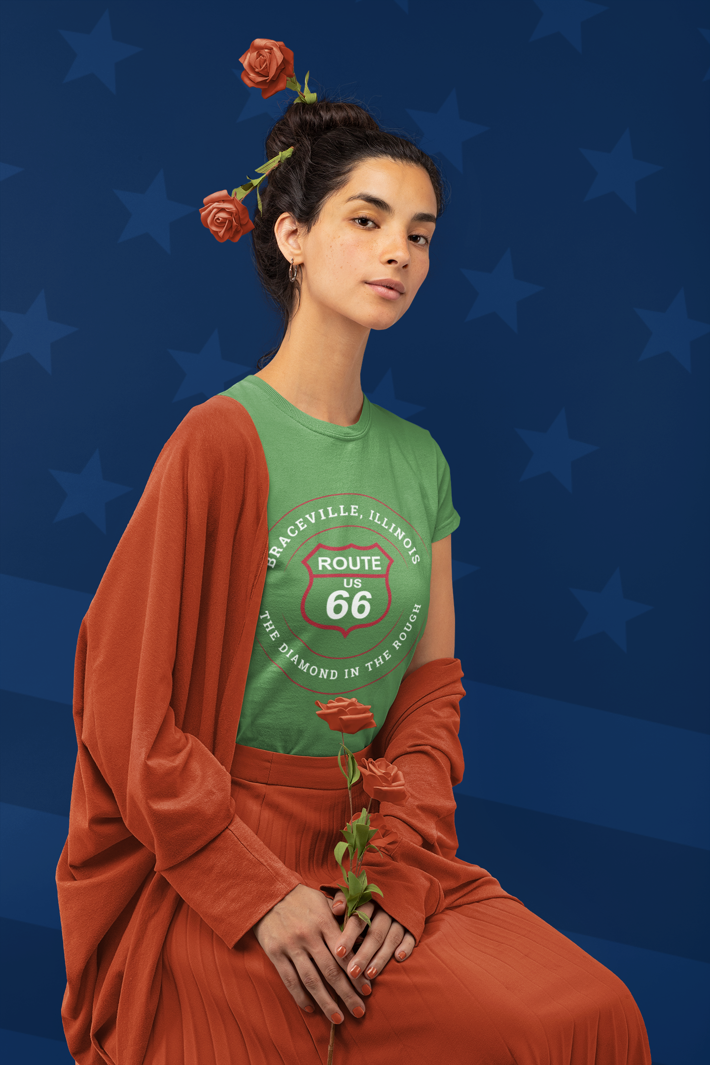 Female model wearing a partially exposed orange jacket and a leaf retro Route 66 unisex jersey tee with a Braceville, IL: "The Diamond in the Rough" design