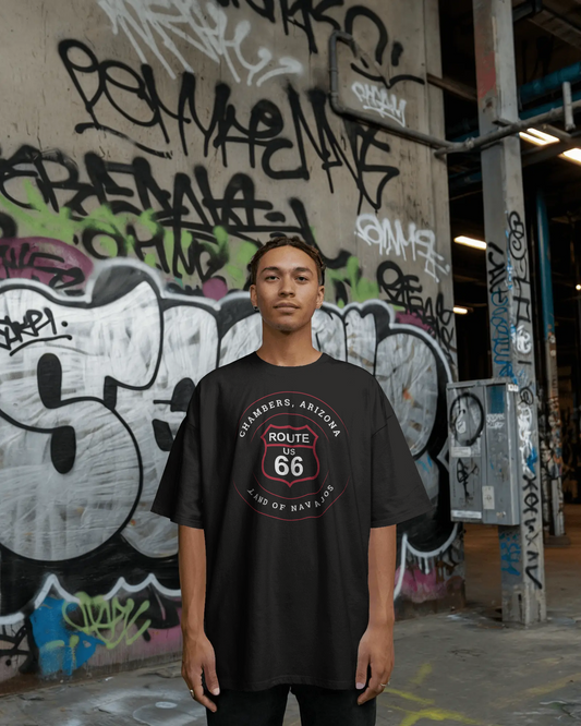 Female model wearing vintage black retro Route 66 unisex jersey tee with Chambers, AZ: "Land Of Navajos" design