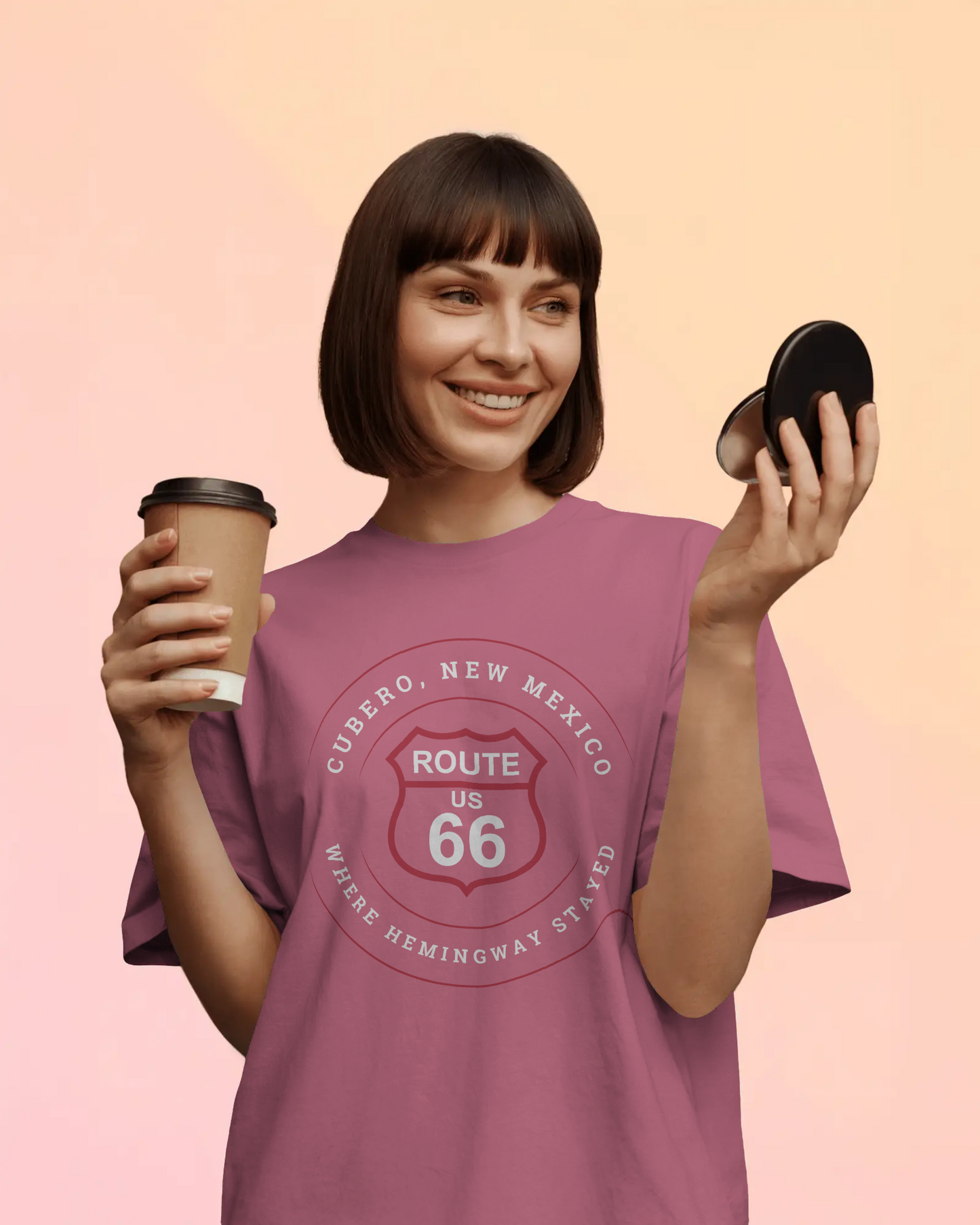 Female model wearing heather raspberry retro Route 66 unisex jersey tee with Cubero, NM: Where Hemingway Stayed graphic