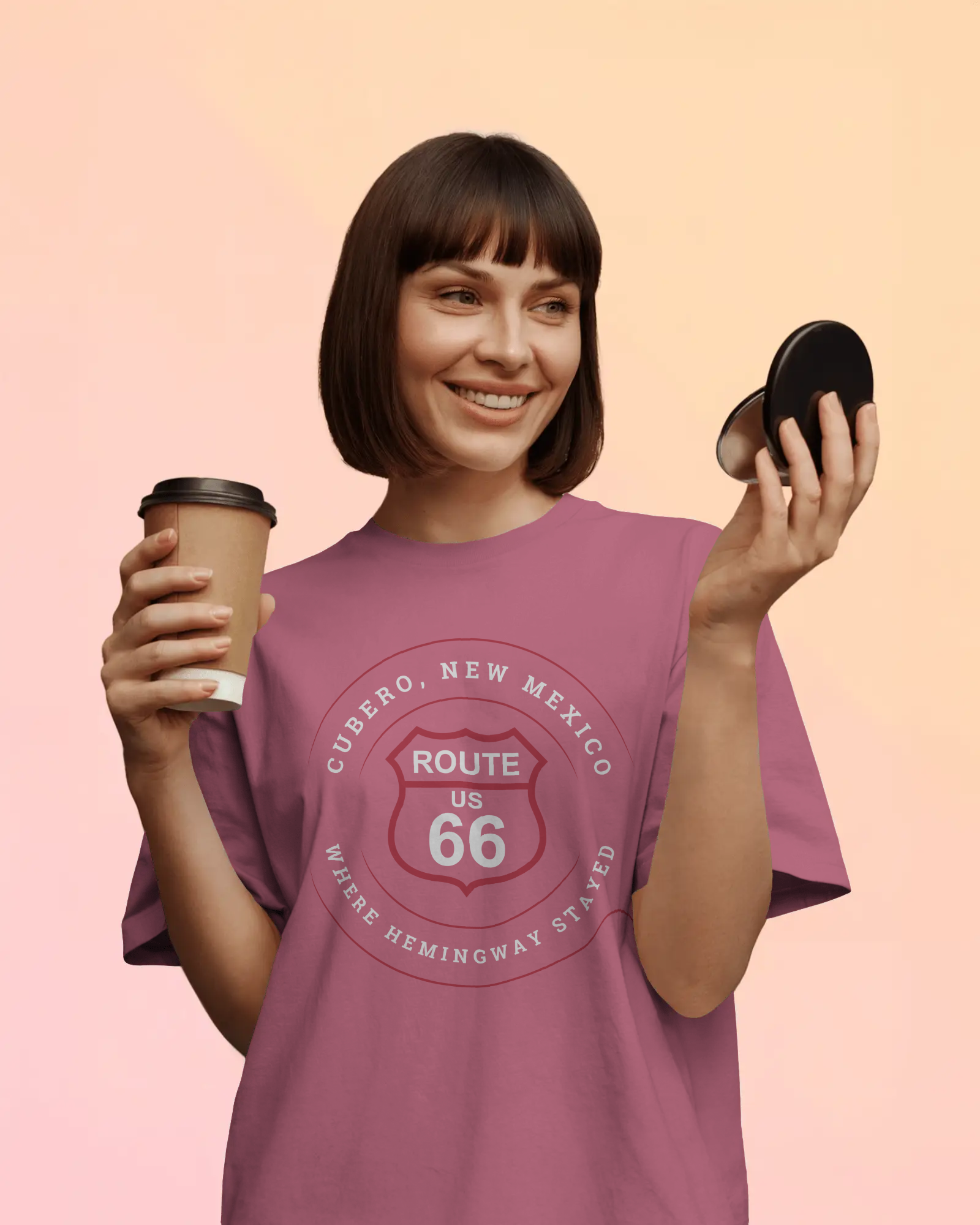 Female model wearing heather raspberry retro Route 66 unisex jersey tee with Cubero, NM: Where Hemingway Stayed graphic