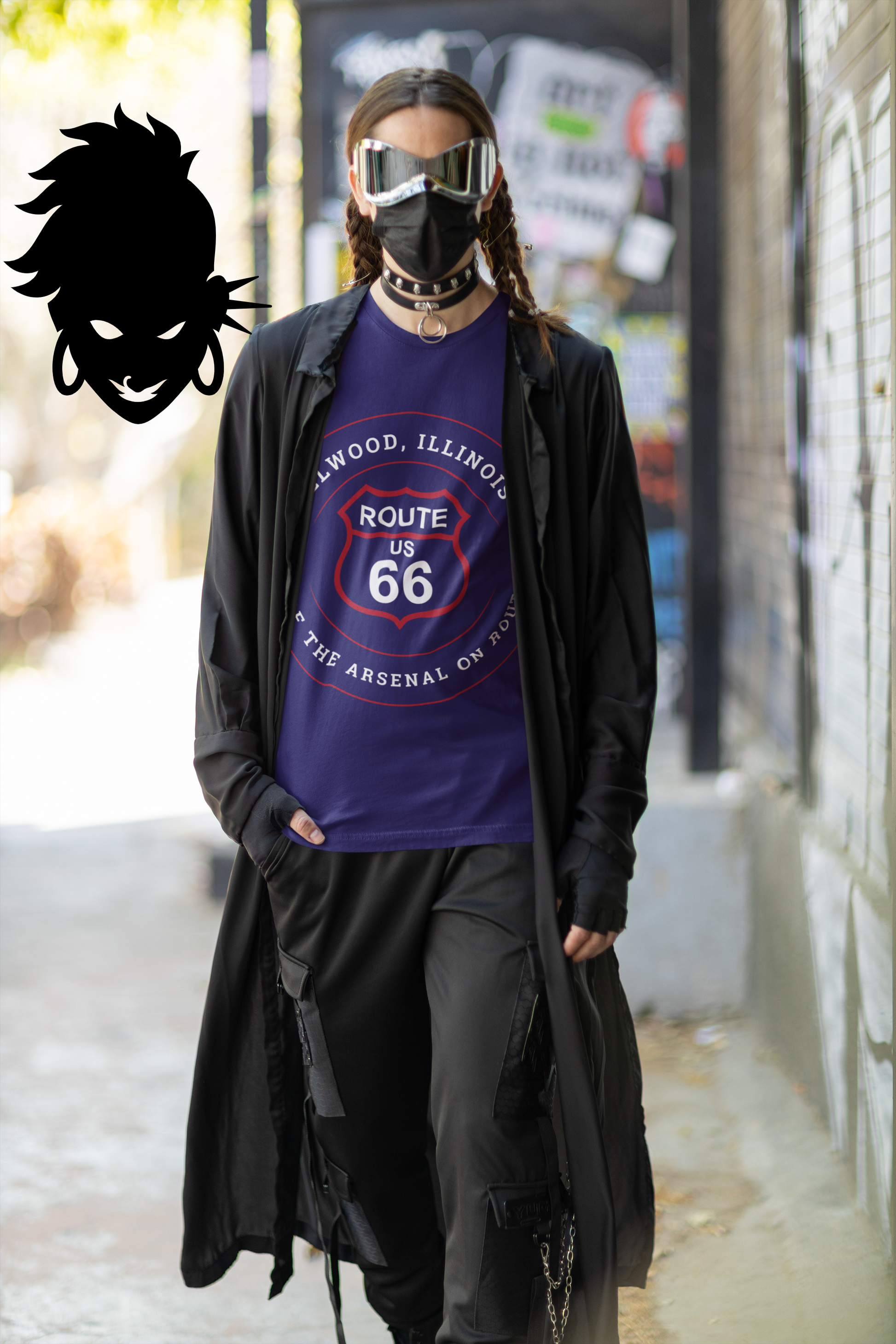 Female model wearing a team navy retro Route 66 unisex jersey tee with a Elwood, IL: "Site of the Arsenal on Route 66" design