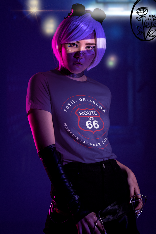 Female model wearing heather team purple retro Route 66 unisex jersey tee with Foyil, OK "World's Largest Totem Pole" design