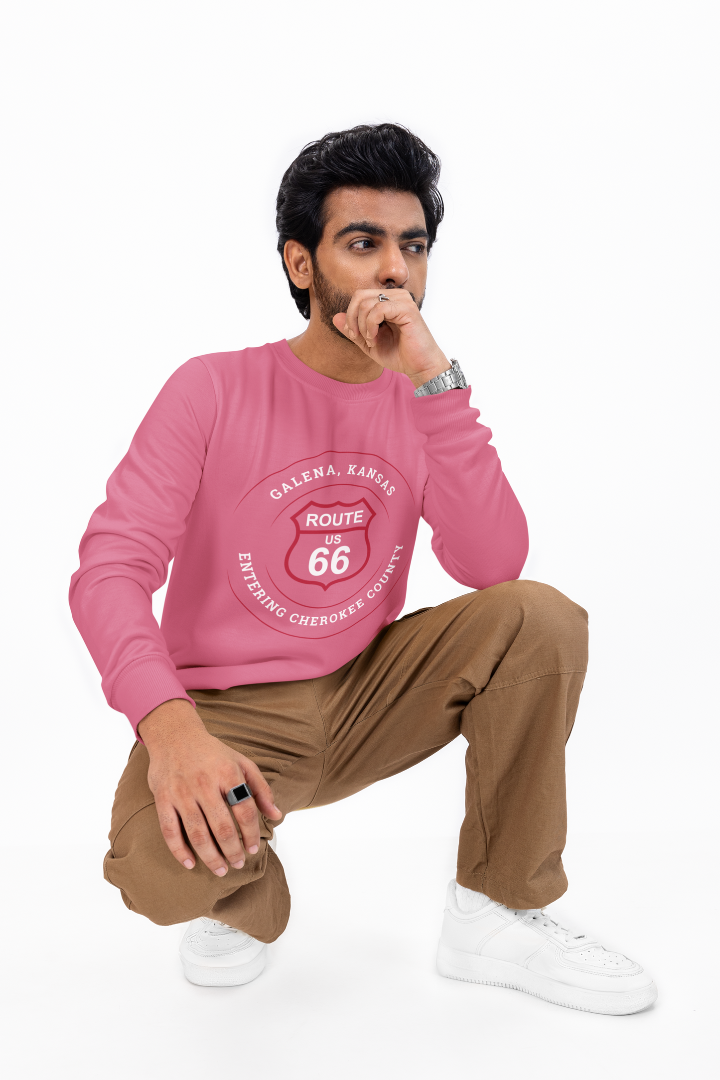 Male model wearing heather raspberry retro Route 66 unisex jersey tee with Galena, KS "Entering Cherokee County" design