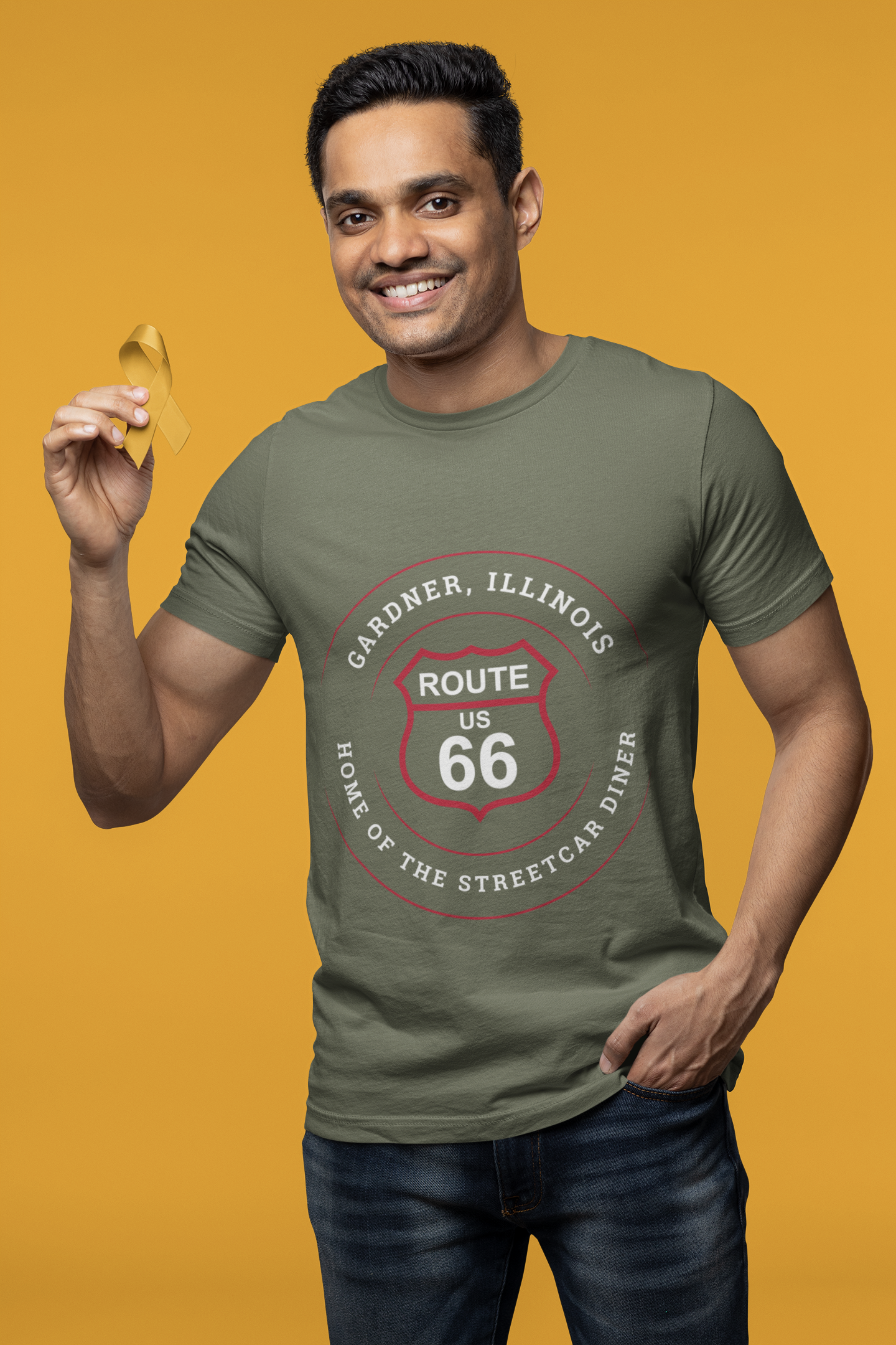 Male model wearing a black retro Route 66 unisex jersey tee with a Gardner, IL: "Home of the Streetcar Diner" design