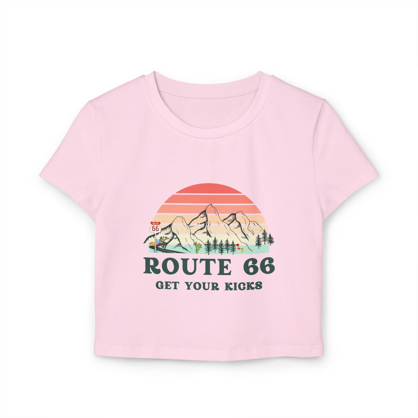 Light pink Route 66 "Get Your Kicks" women's baby tee with vintage sunset and mountain graphic, flat lay view.