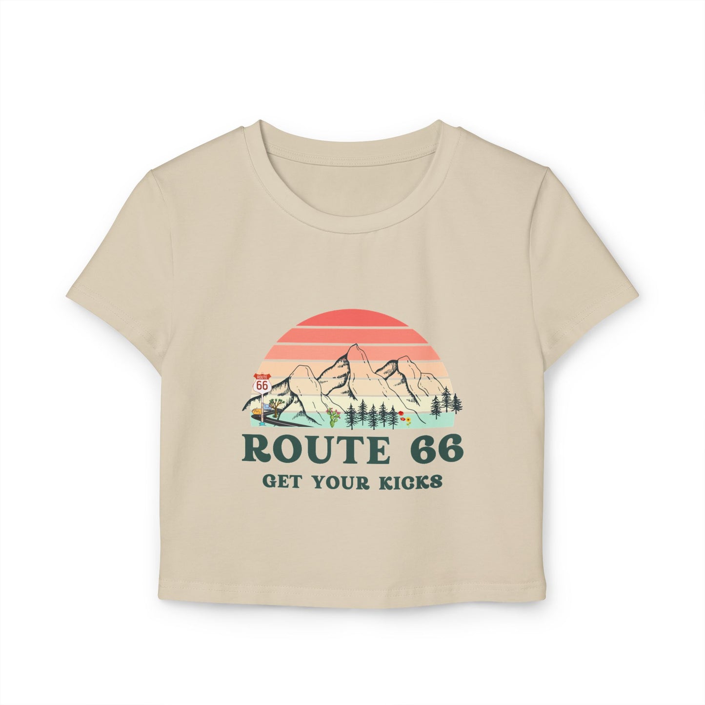 Sand Route 66 "Get Your Kicks" women's baby tee with vintage sunset and mountain graphic, flat lay view.