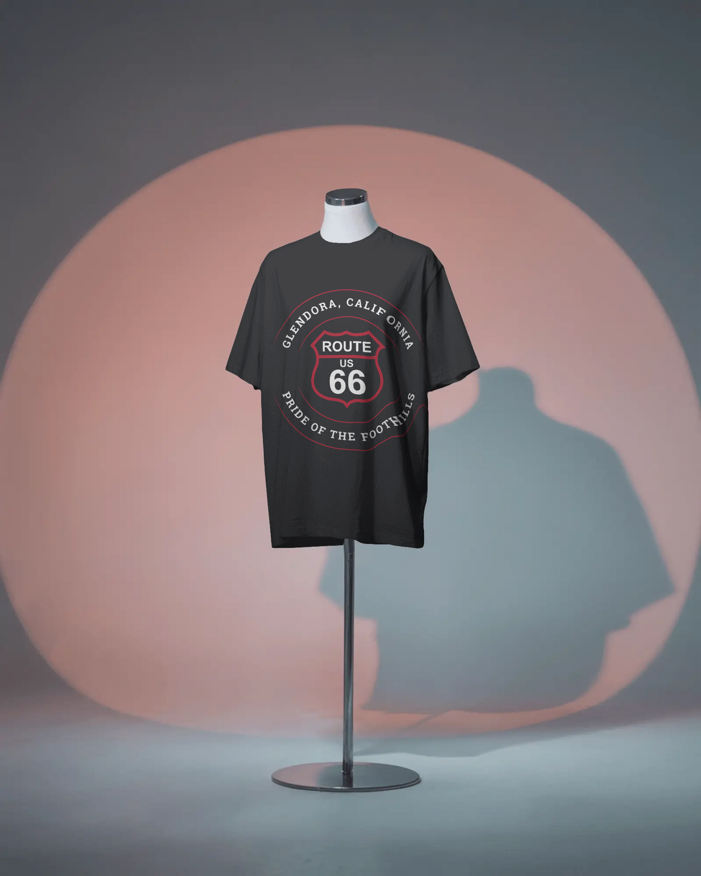 A black heather retro Route 66 unisex jersey tee with Glendora, CA: "Pride of the Foothills" design displayed on a headless mannequin
