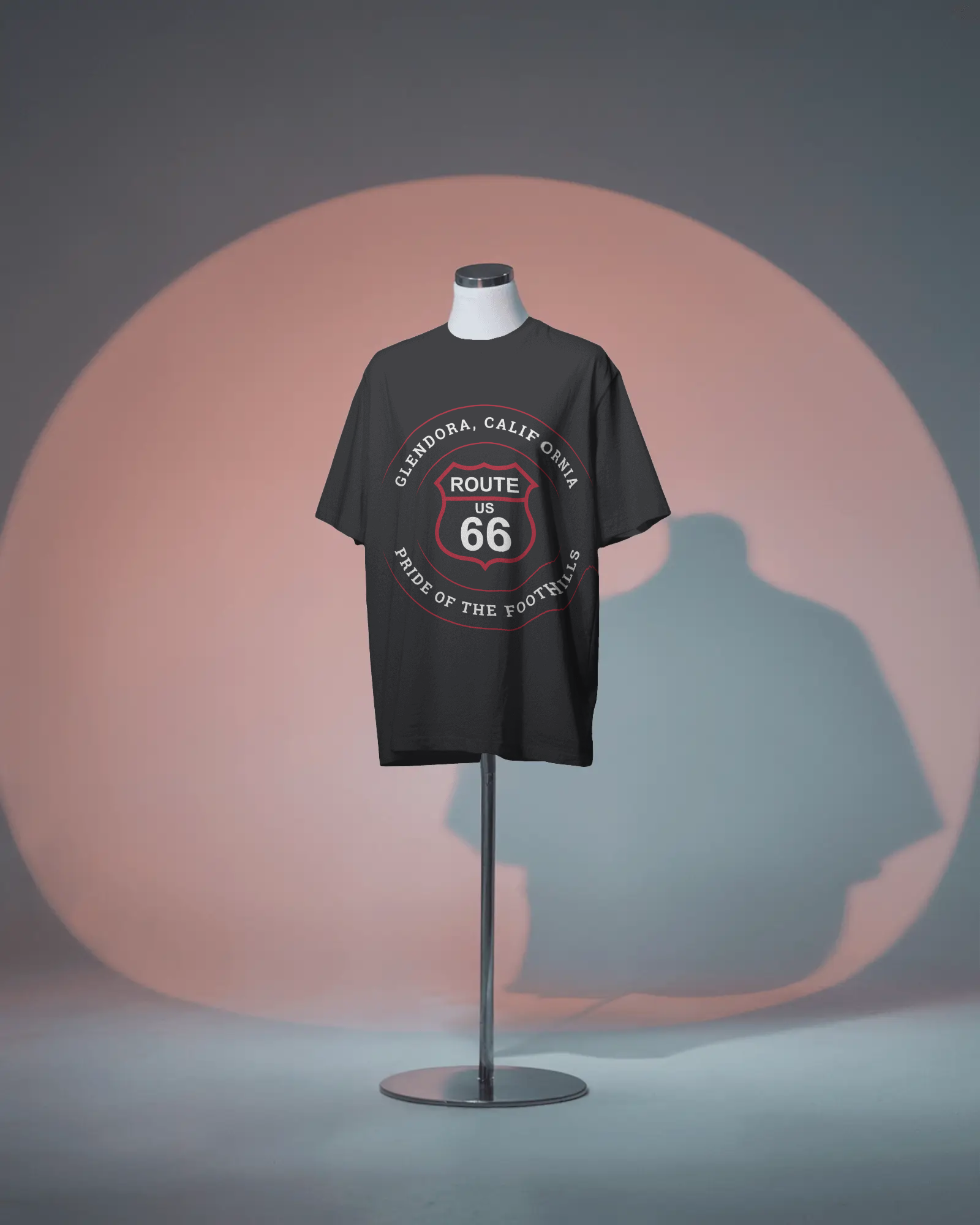 A black heather retro Route 66 unisex jersey tee with Glendora, CA: "Pride of the Foothills" design displayed on a headless mannequin