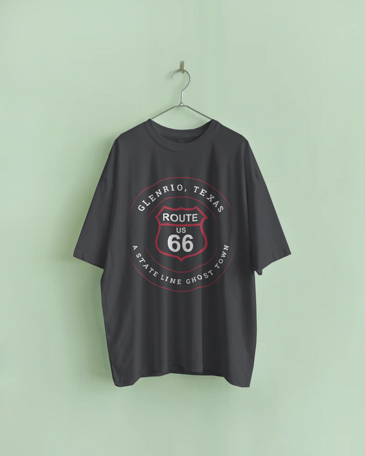 Vintage black retro Route 66 unisex jersey tee with Glenrio, TX: A State Line Ghost Town on metal hanger