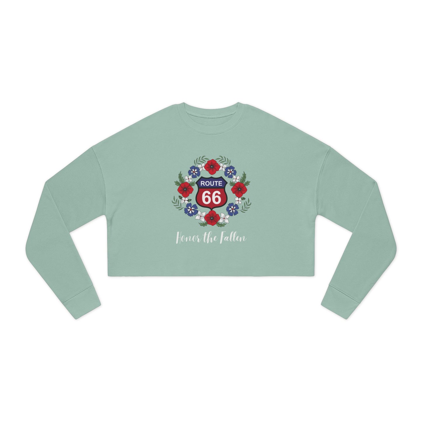 Flat lay of dusty blue cropped Route 66 “Honor the Fallen” sweatshirt featuring red Route 66 shield surrounded by a poppy wreath and the phrase “Honor the Fallen” is written beneath the design