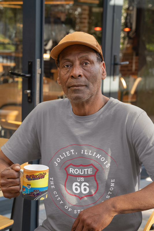 Male model wearing a grey retro Route 66 unisex jersey tee with a Joliet, IL: "The City of Steel and Stone" design