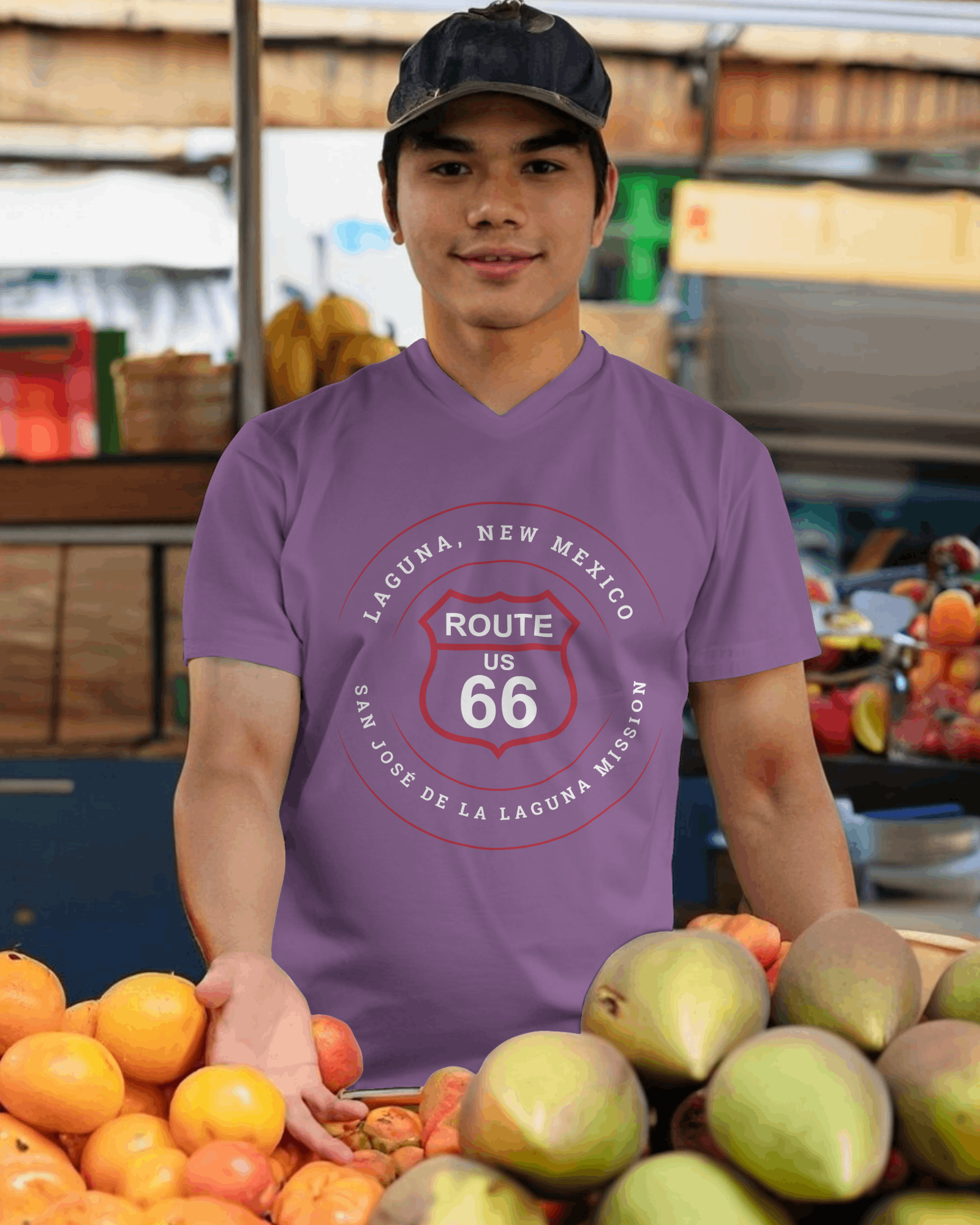 Female model wearing heather team purple retro Route 66 unisex jersey tee with Laguna, NM: "San José de la Laguna Mission" design
