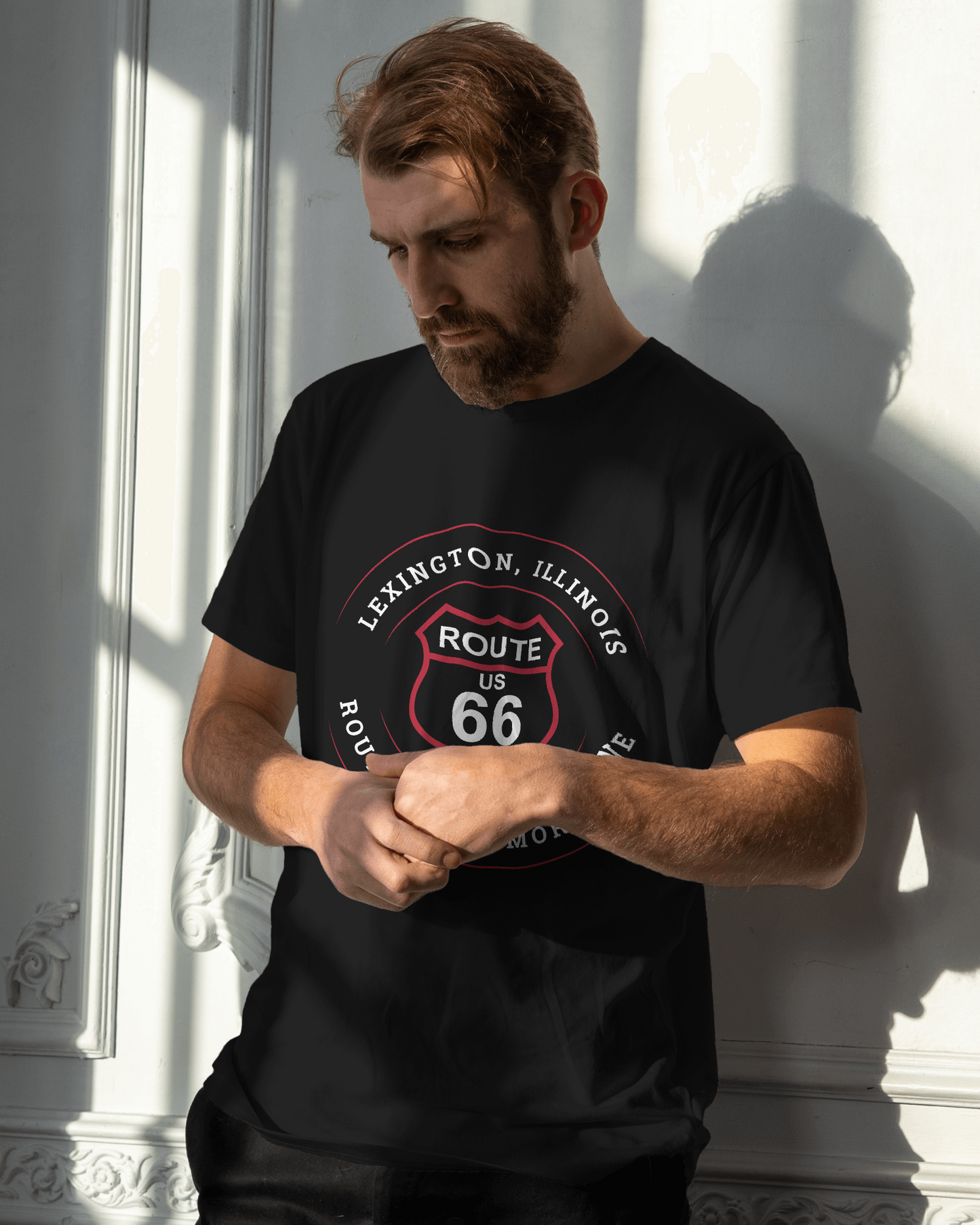 Man wearing a black retro Route 66 unisex jersey tee with a Lexington, IL "Route 66 Memory Lane" design