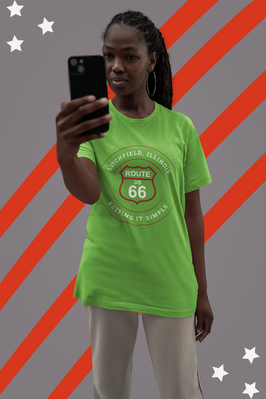Female model wearing a lime green retro Route 66 unisex jersey tee with a Litchfield, IL:: "Keeping It Simple" design