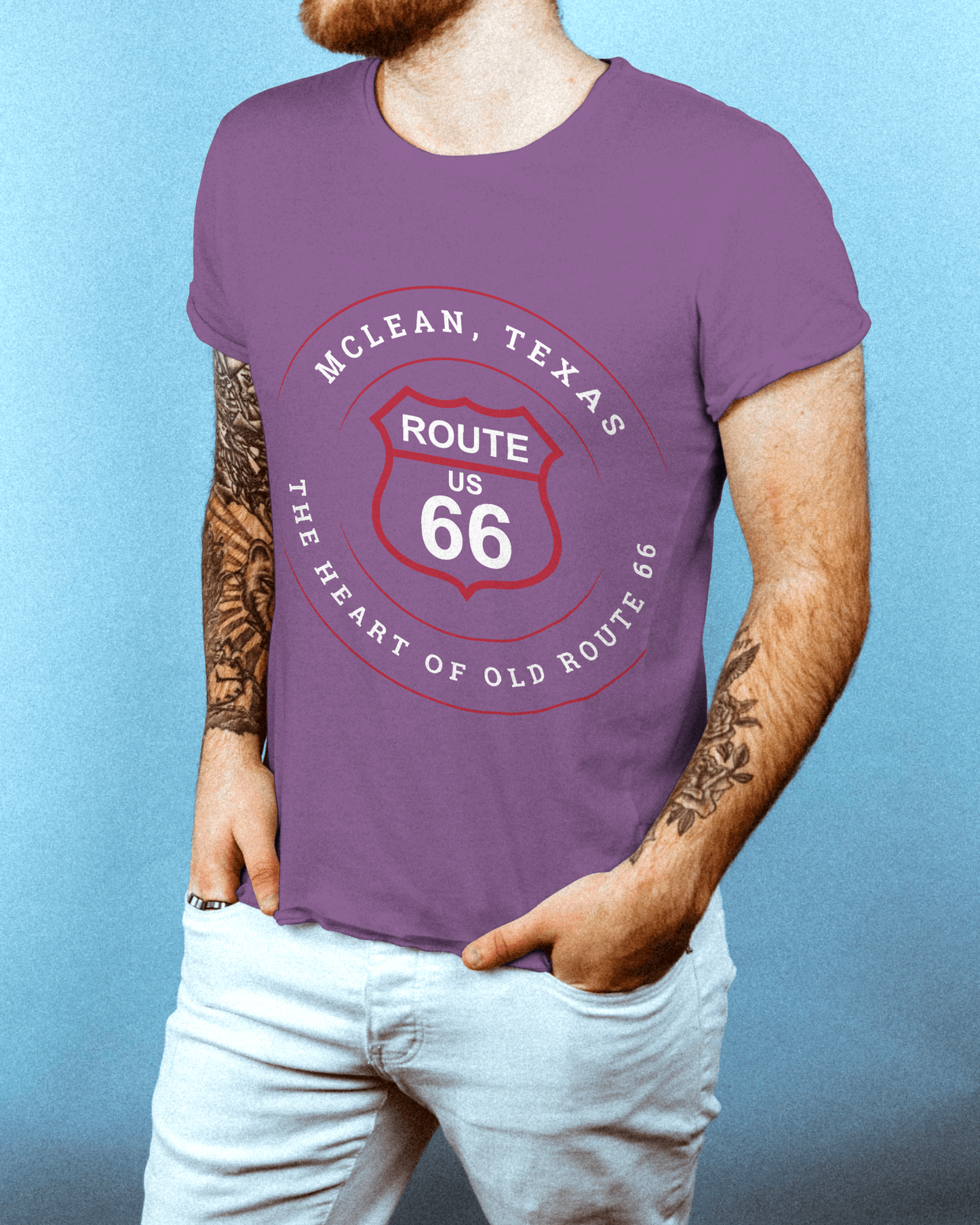 Male model wearing heather team purple retro Route 66 unisex jersey tee with McLean, TX: The Heart of Old Route 66 graphic