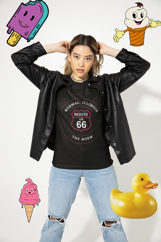 Female model wearing a black heather retro Route 66 unisex jersey tee with a Normal, IL: "The Norm" design