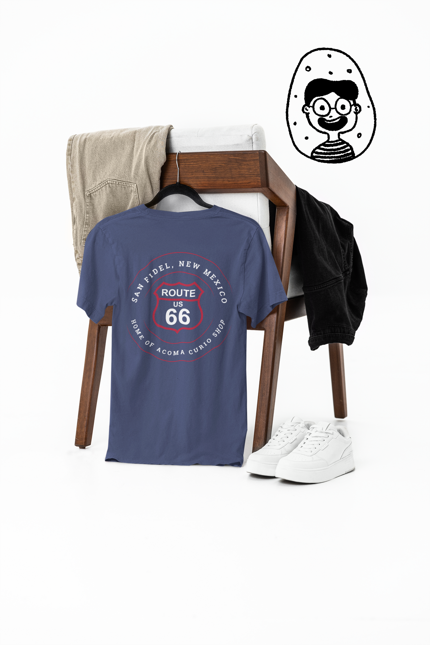 A heather true royal retro Route 66 unisex jersey tee with San Fidel, NM: "Home of the Acoma Curio Shop" design displayed on a hanger 