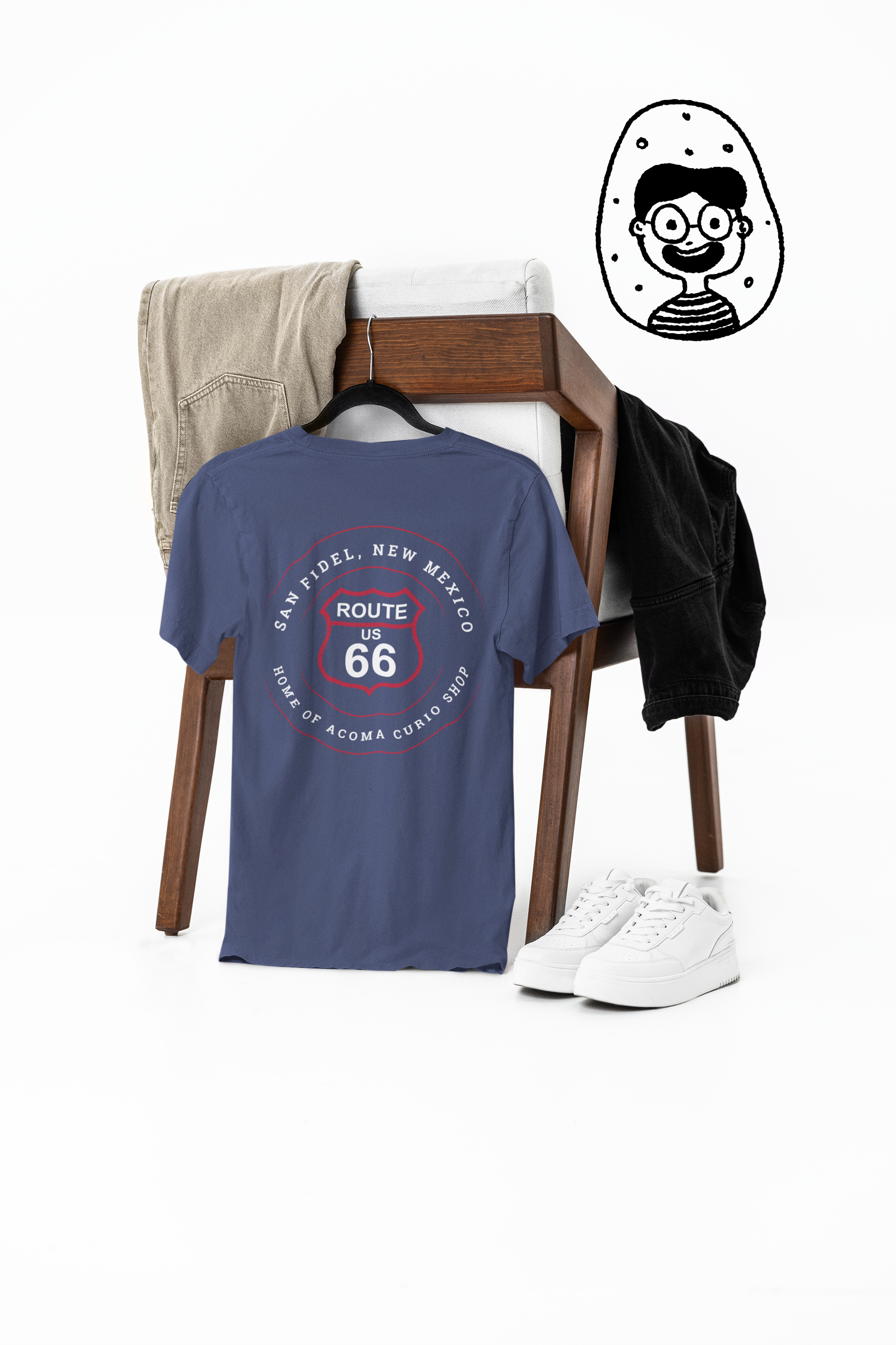 A heather true royal retro Route 66 unisex jersey tee with San Fidel, NM: "Home of the Acoma Curio Shop" design displayed on a hanger 