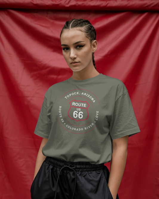 Female model wearing heather military green retro Route 66 unisex jersey tee with Topock, AZ: "Route 66 + Colorado River = Love" design
