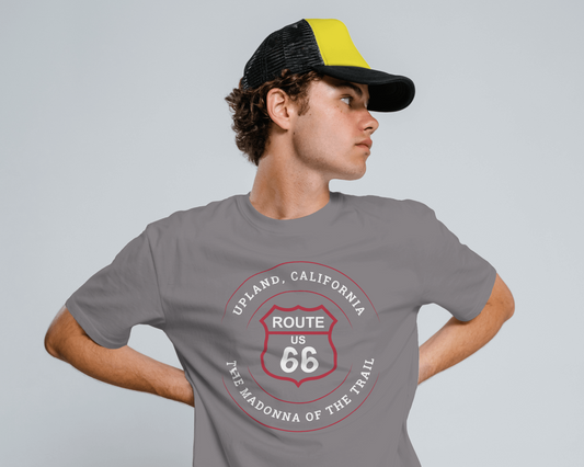 Male model wearing dark grey heather retro Route 66 unisex jersey tee with Upland, CA: "The Madonna of the Trail" design