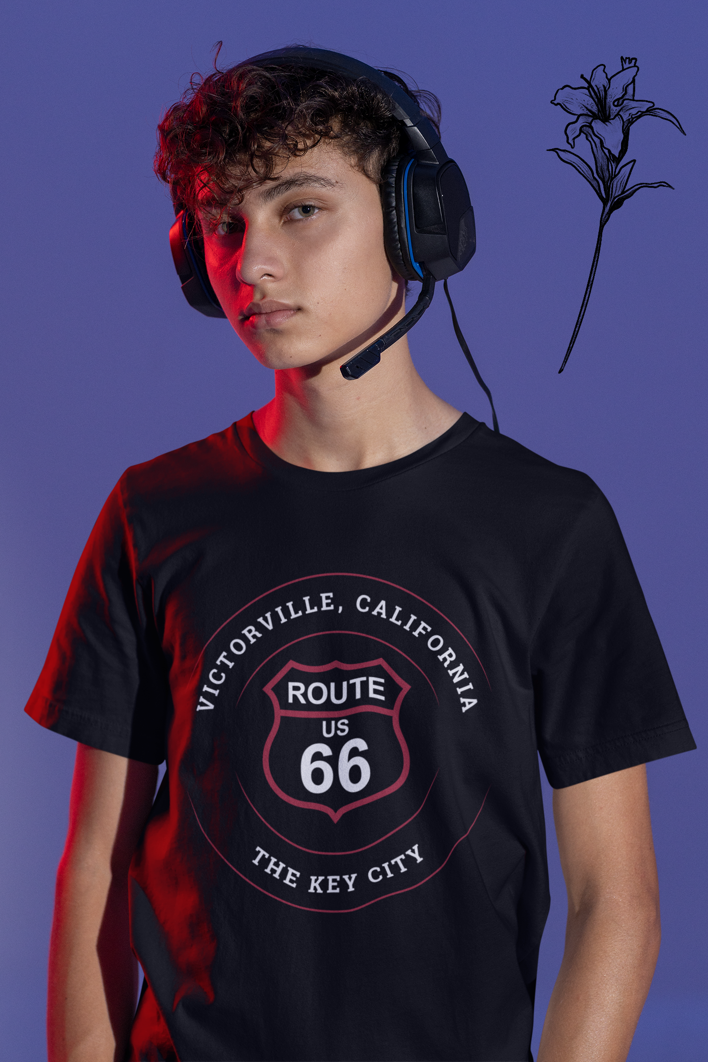 Male model wearing vintage black retro Route 66 unisex jersey tee with Victorville, CA: "The Key City" design