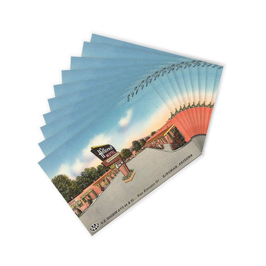 A set of ten vintage Hillcrest Motel postcards from Kingman, Arizona, featuring the iconic motel sign and a classic Route 66 roadside scene, ideal for collectors of travel memorabilia and historical tourism