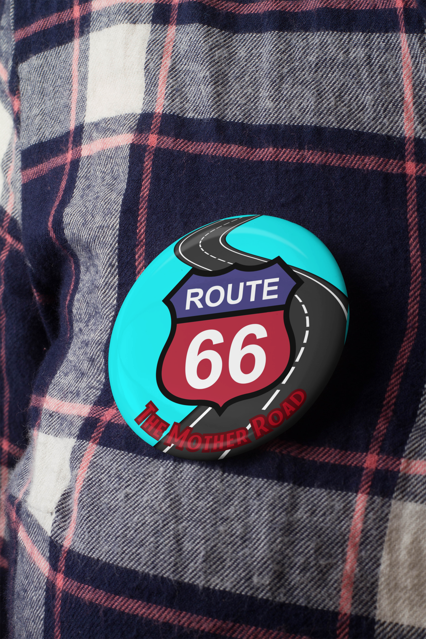 Route 66 pin button with red-and-blue shield and winding road design attached to plaid shirt, perfect retro accessory for travelers and vintage lovers