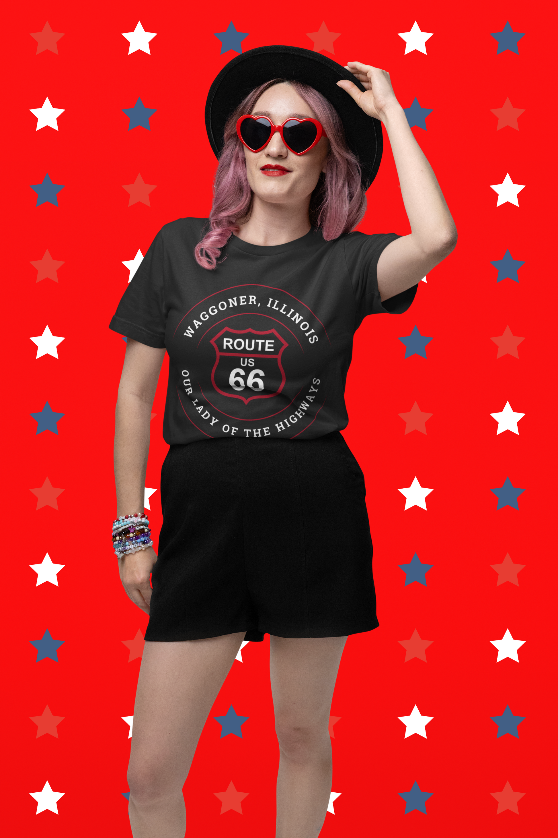 Female model wearing a vintage black retro Route 66 unisex jersey tee with a Waggoner, IL:: "Our Lady of the Highways" design