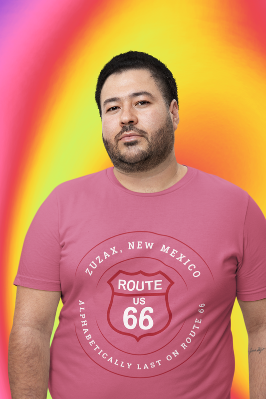 Male model wearing heather raspberry retro Route 66 unisex jersey tee with Zuzax, NM: "Alphabetically Last on Route 66" design